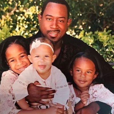 Martin Lawrence and his kids took a picture together when they were young.
